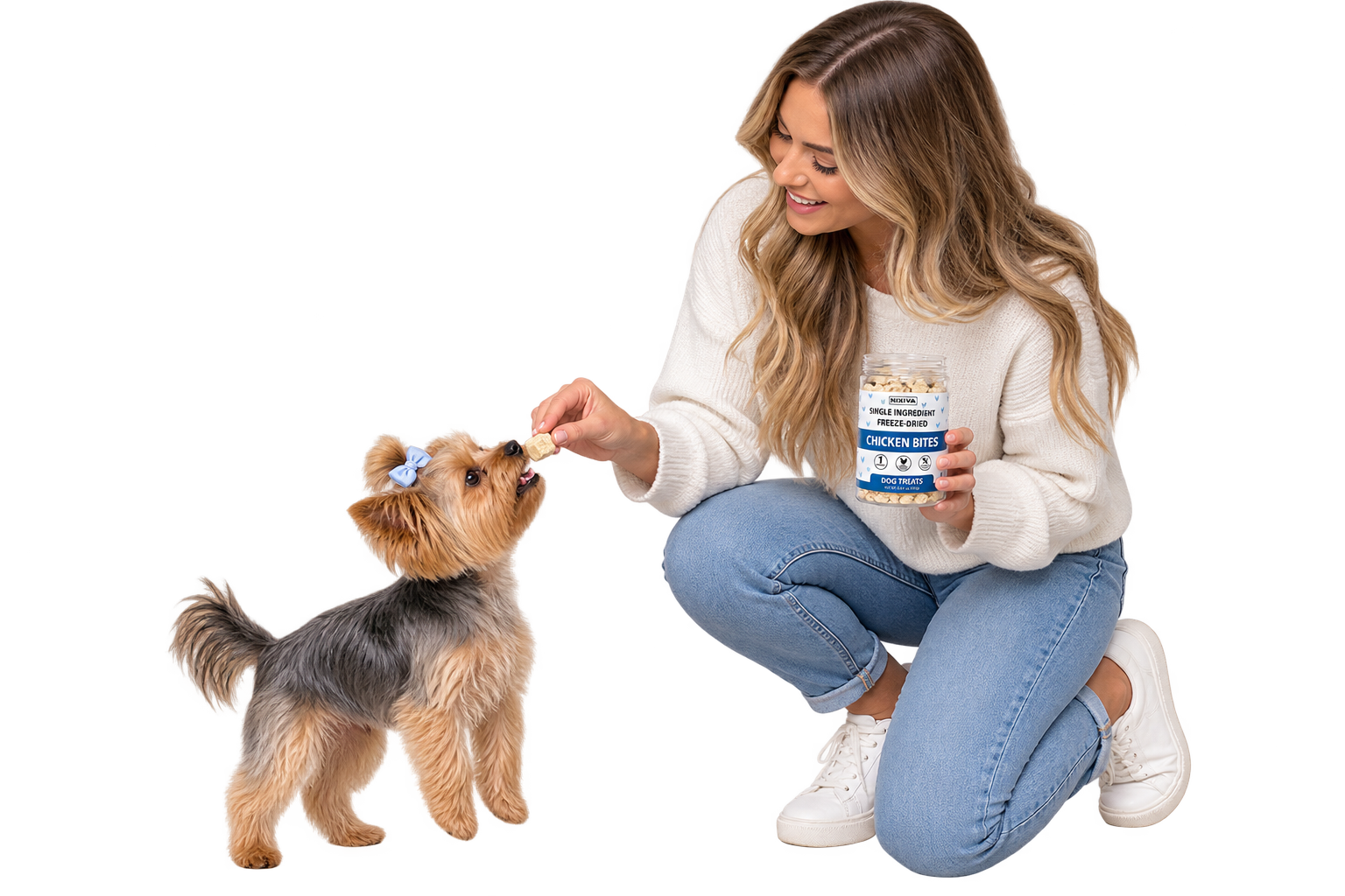 A woman offering a NIXIVA treat to her dog